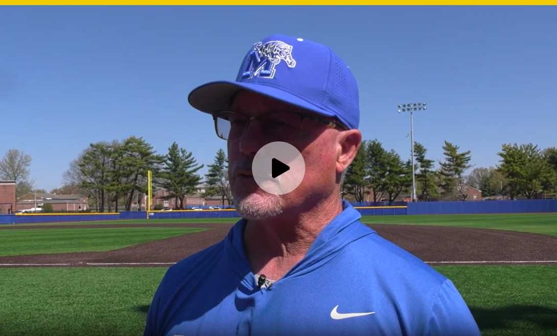 Coach standing on a baseball field during the Collegiate Consulting Program video cover.