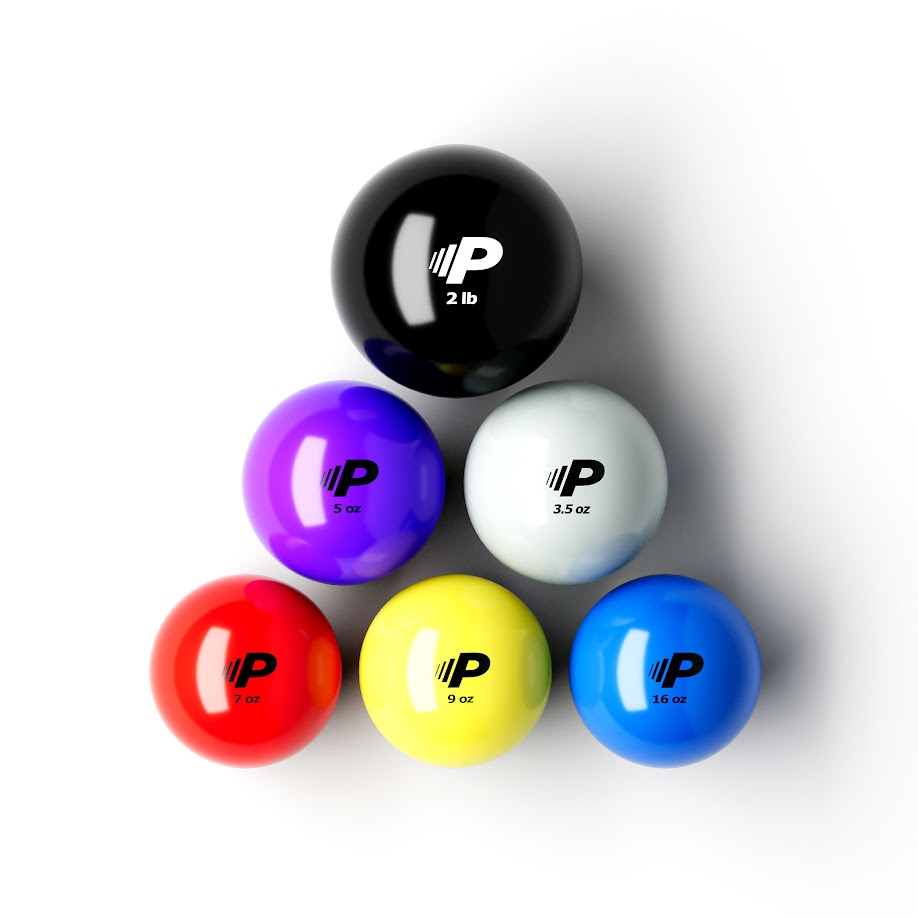 Pylo balls set arranged in a pyramid, featuring six weighted training balls in different colors and weights. Each ball has a 'P' logo with its corresponding weight labeled, ranging from 3.5 oz to 2 lb