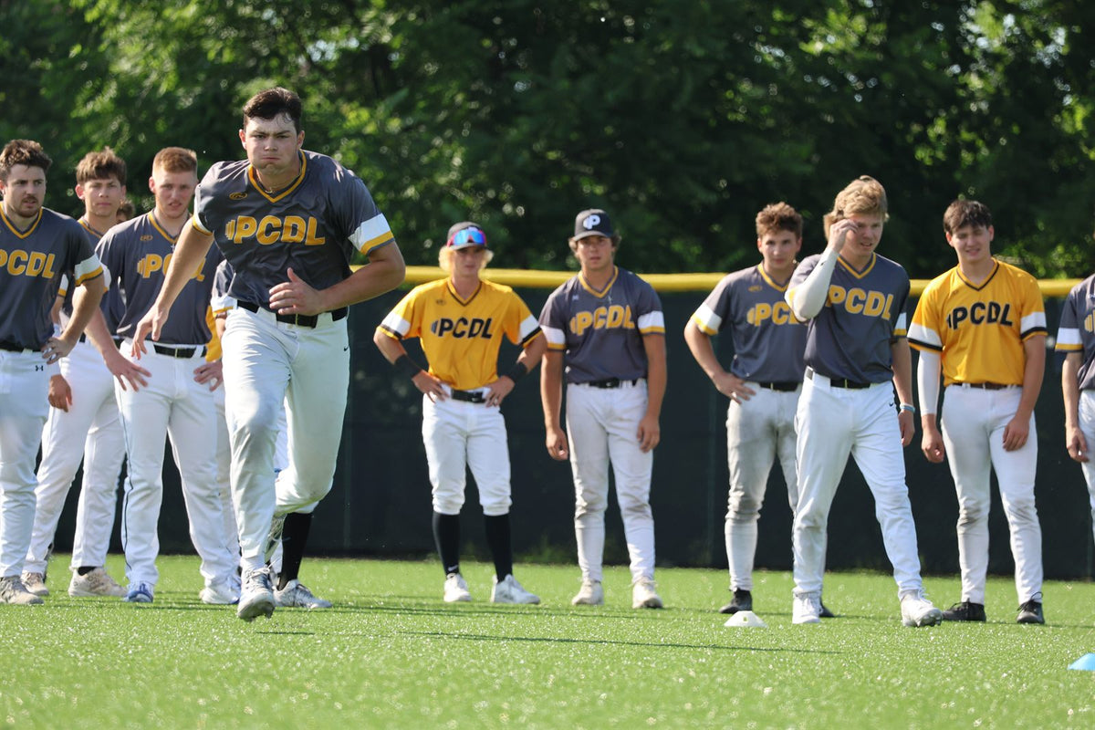 PCDL team lined up in the outfield during pregame warm-ups