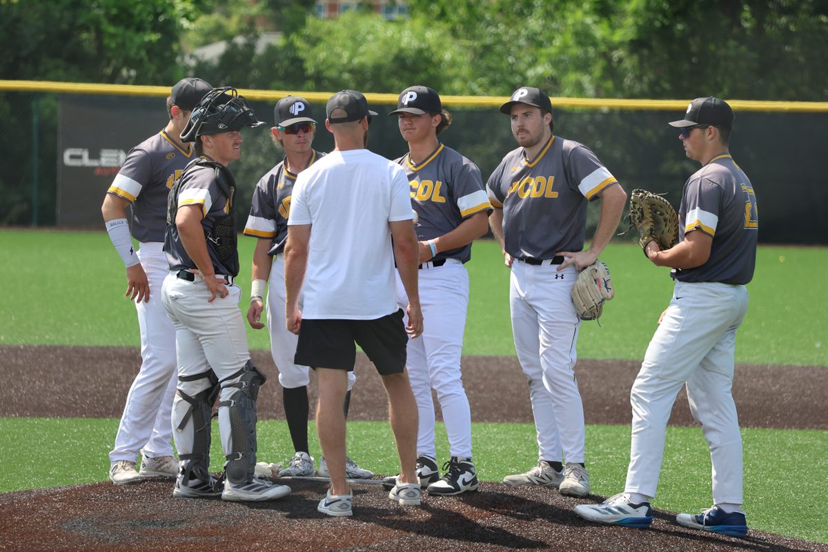 PCDL coach and players meeting at the mound
